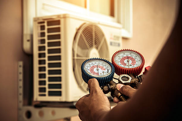 Professional Air Conditioning Service technician working in Acampo, CA